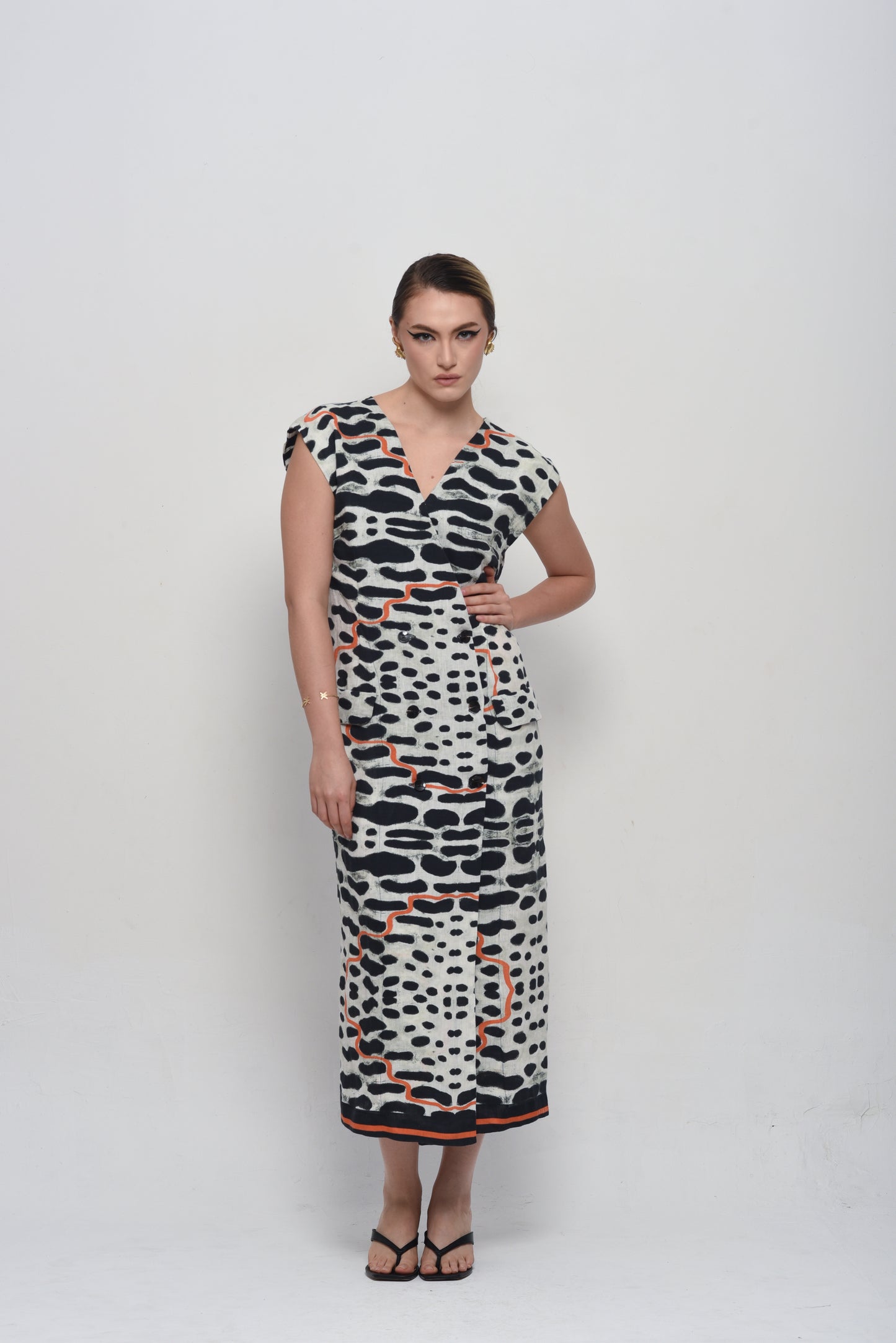 COLETE VESTIDO COURO DE ONÇA