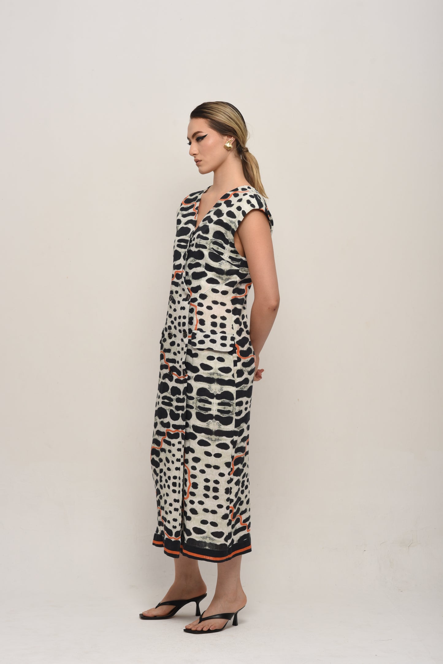 COLETE VESTIDO COURO DE ONÇA